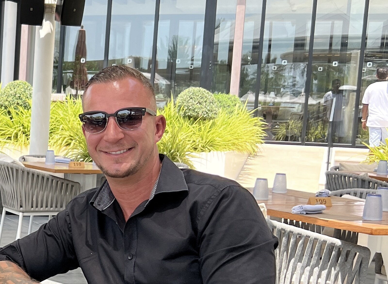 Joachim Nyseth wearing a black shirt and sunglasses